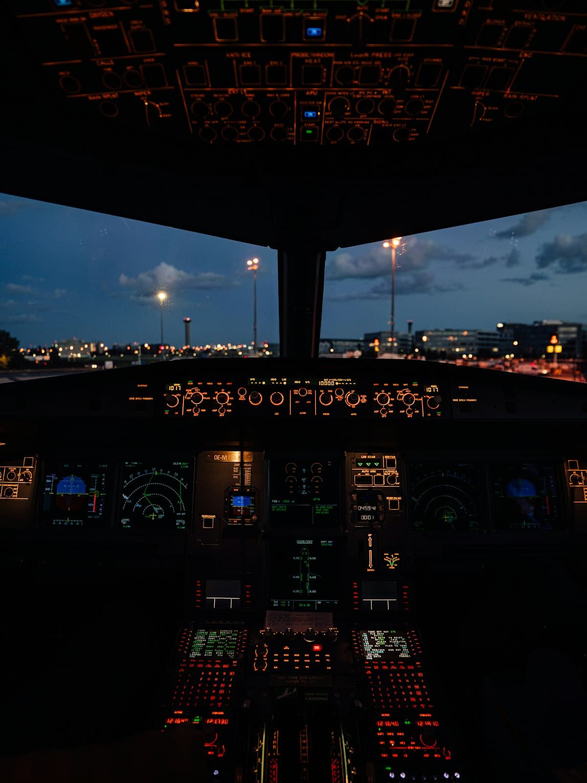 Aircraft cockpit instrument panel at dusk